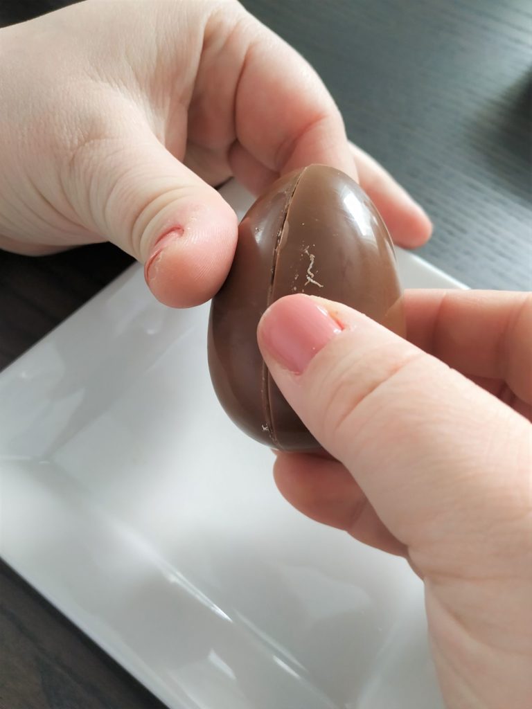 Putting the Kinder shells back together.