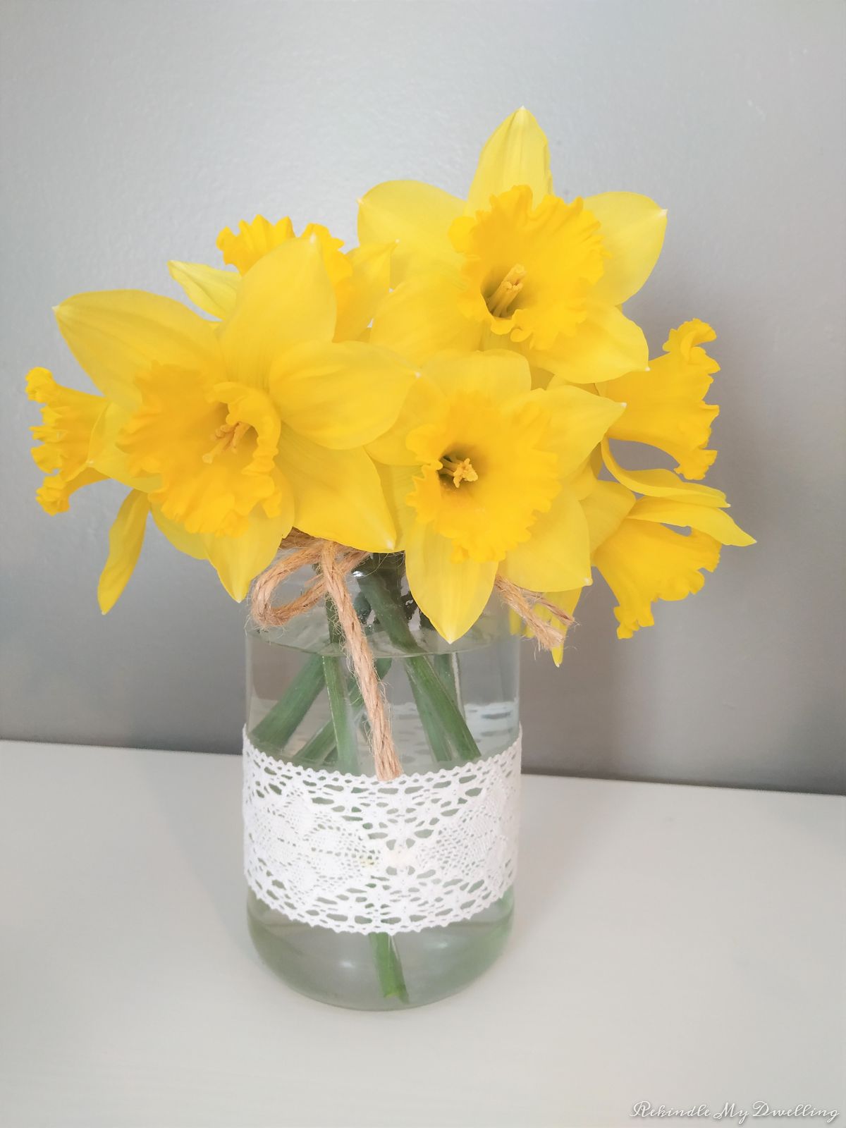 Spring vases with daffodils. 