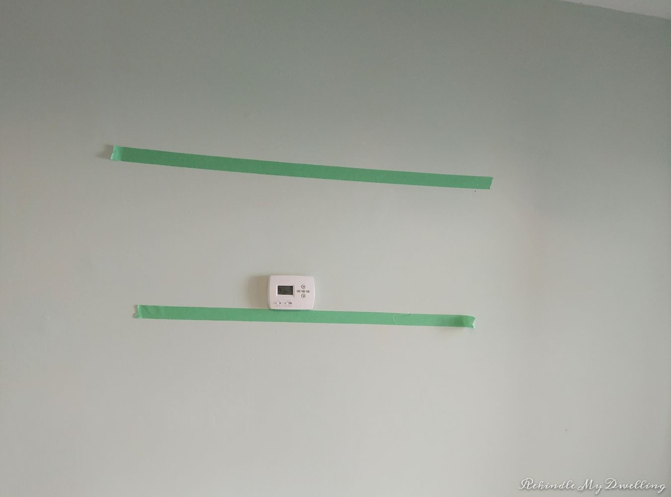 Painters tape on the wall.