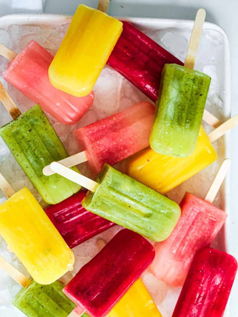 Summer popsicle recipes on a plate.
