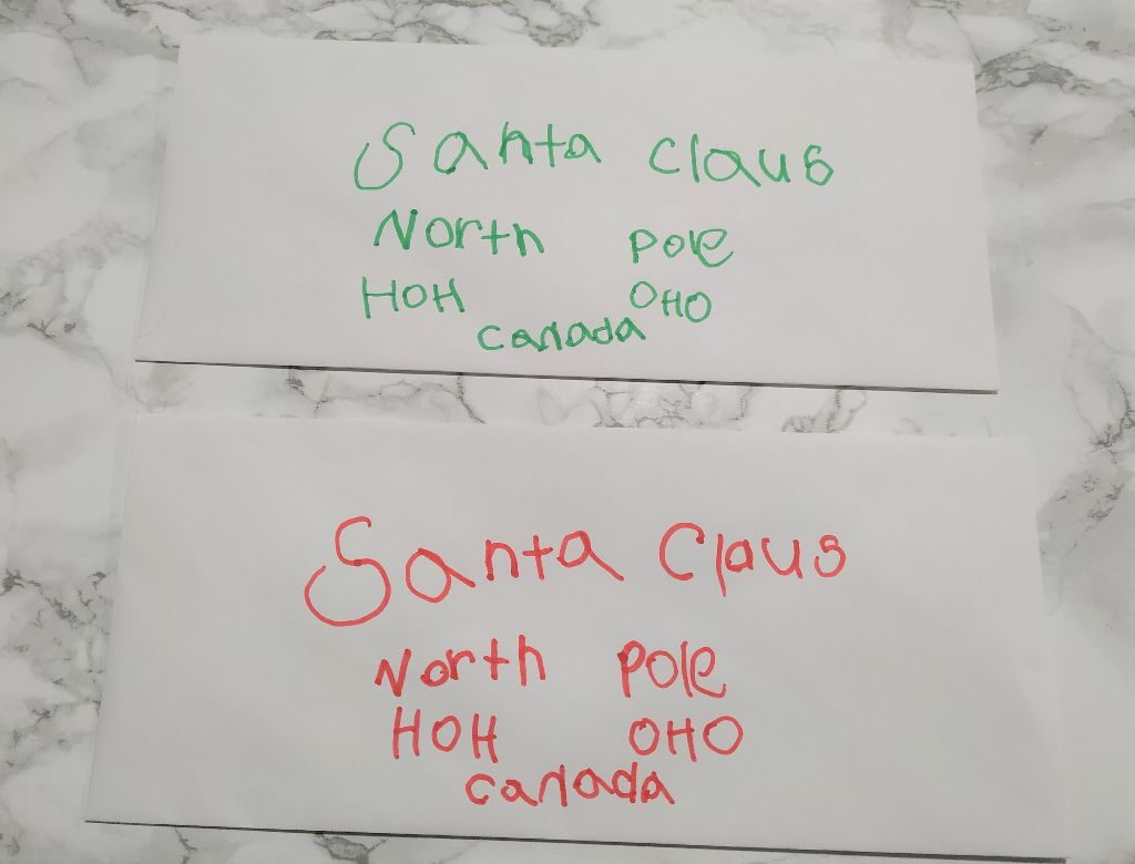 Envelopes with Santa address written on the front.