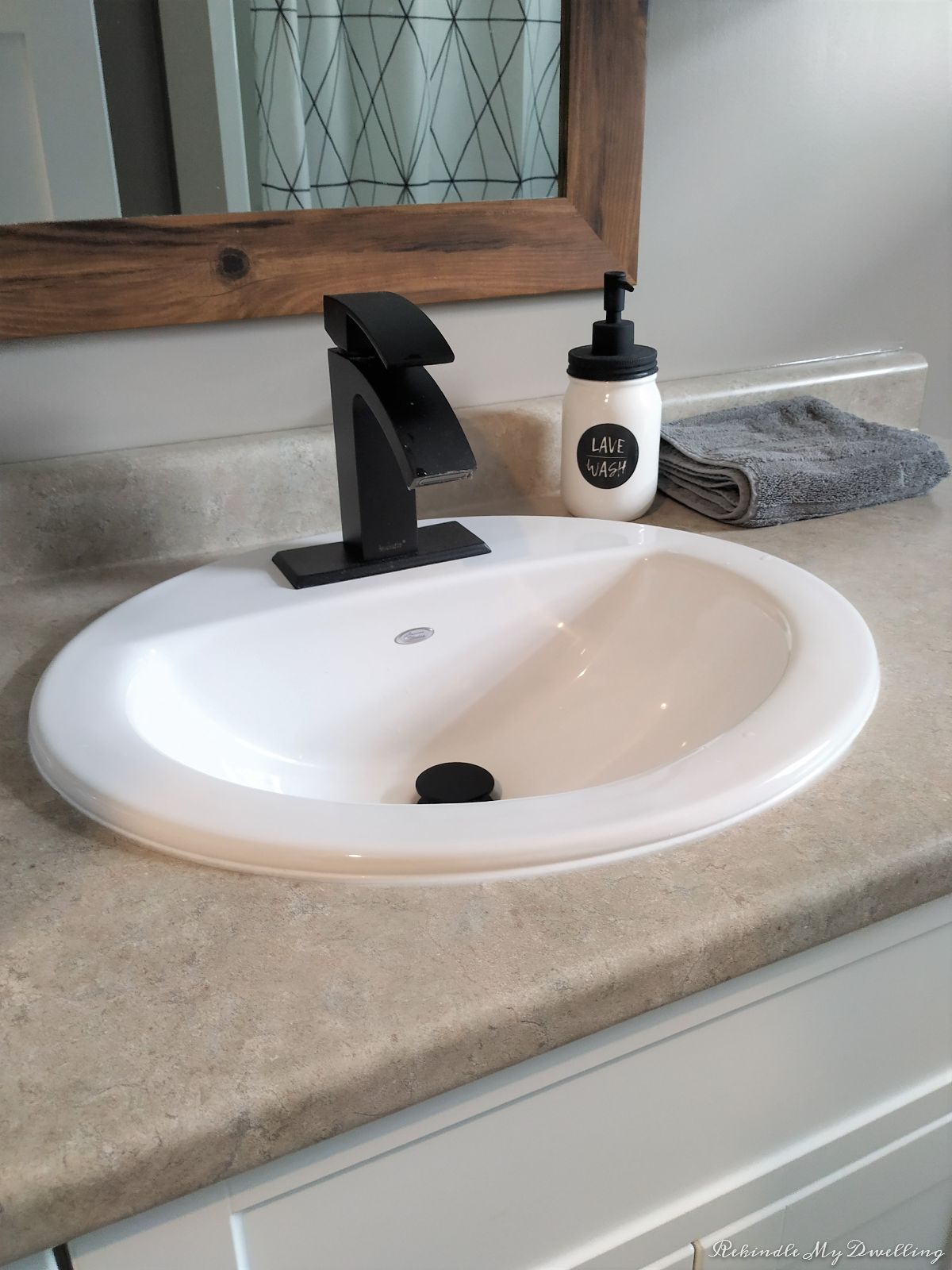 Sink with black hardware.