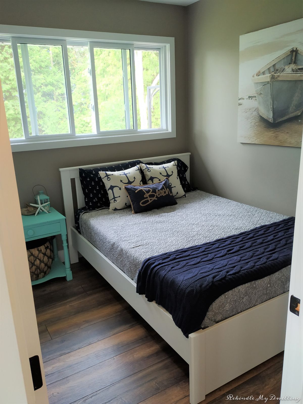 Cottage makeover showing finished bedroom.