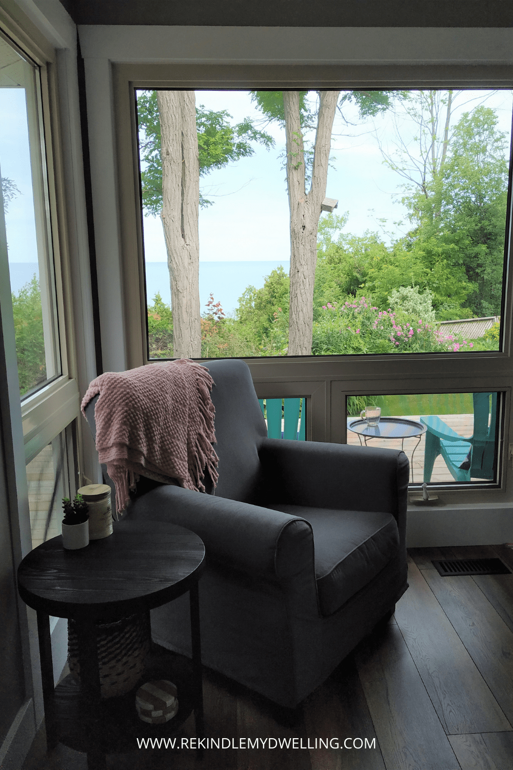 Cottage makeover showing chair, wood table and outside.