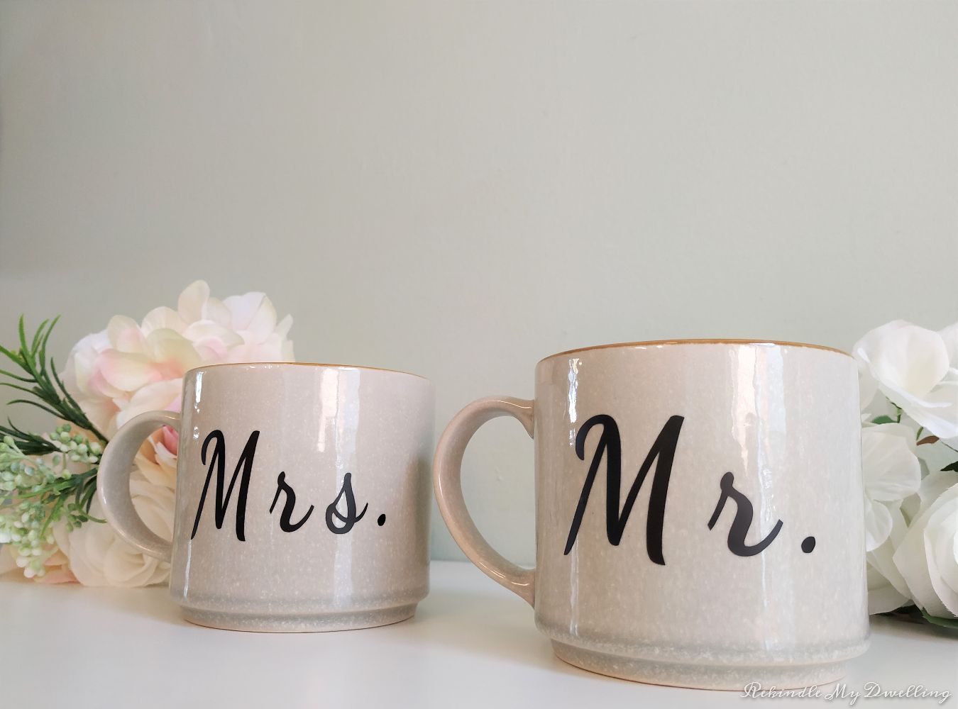 Personalized Mr. and Mrs. wedding gift mugs.