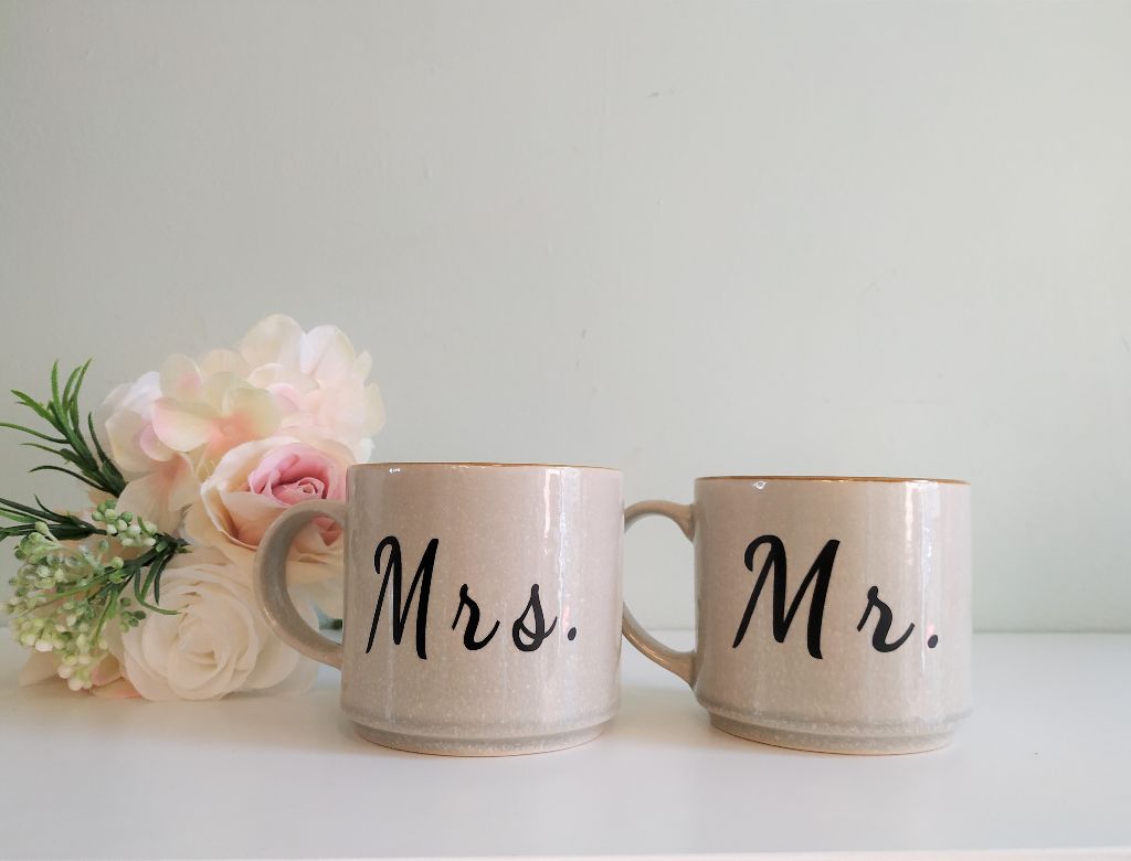 Personalized Mr and Mrs coffee mugs.