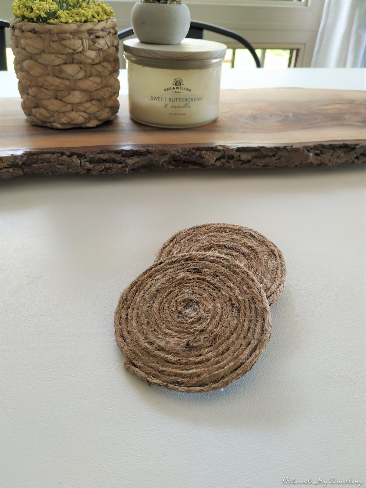 DIY rope coasters stacked together.