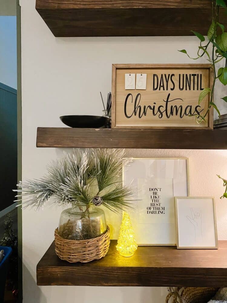 Neutral Christmas decor wooden countdown on a shelf.