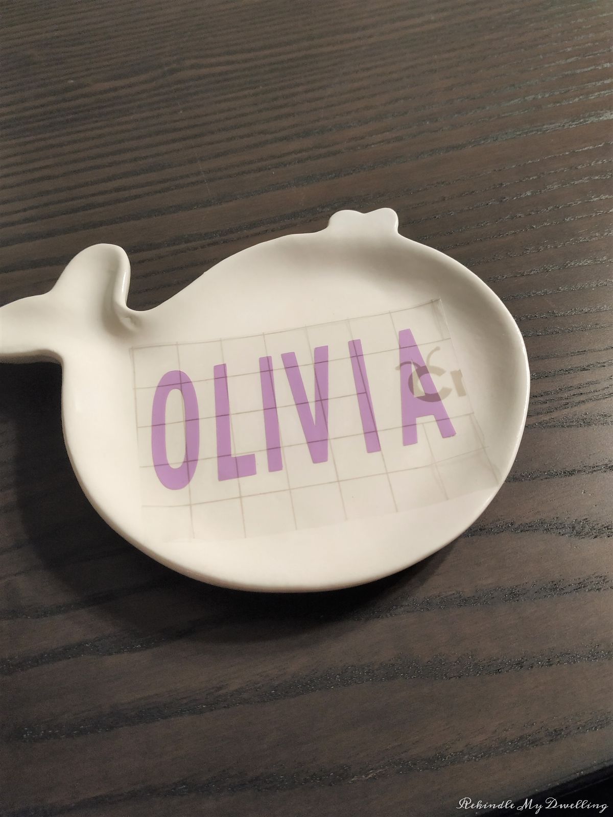 Positioning the name on the trinket dish.