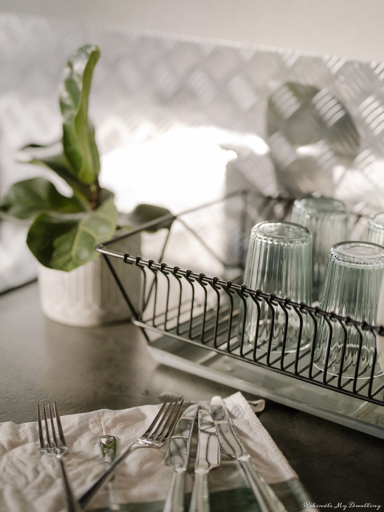 Dishes drying in a rack.