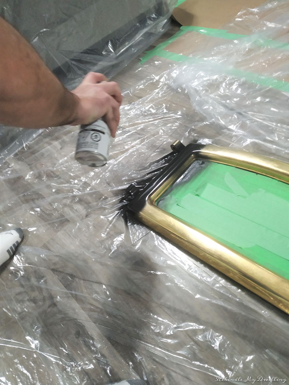 Spray painting the insert door.