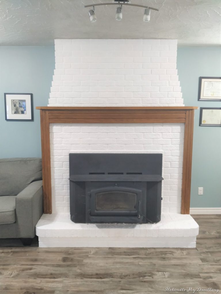 Painted brick fireplace.