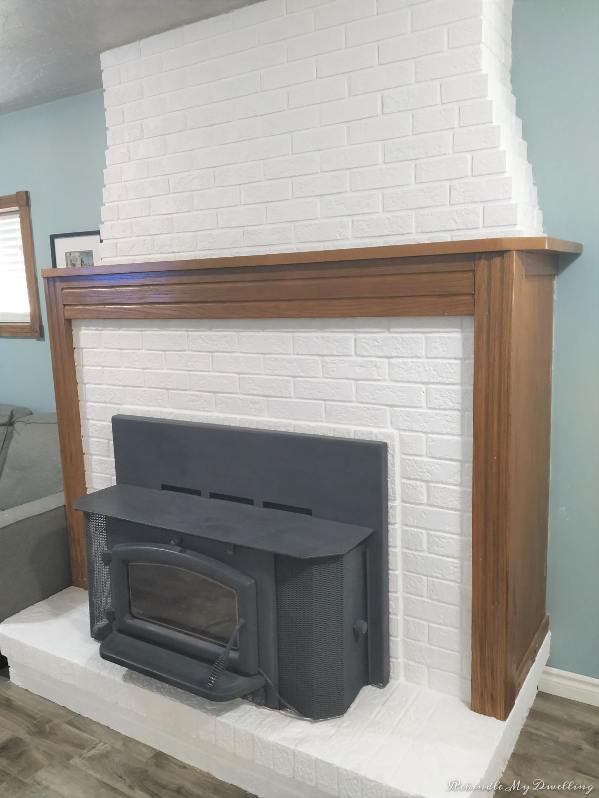 Side view of brick fireplace makeover.