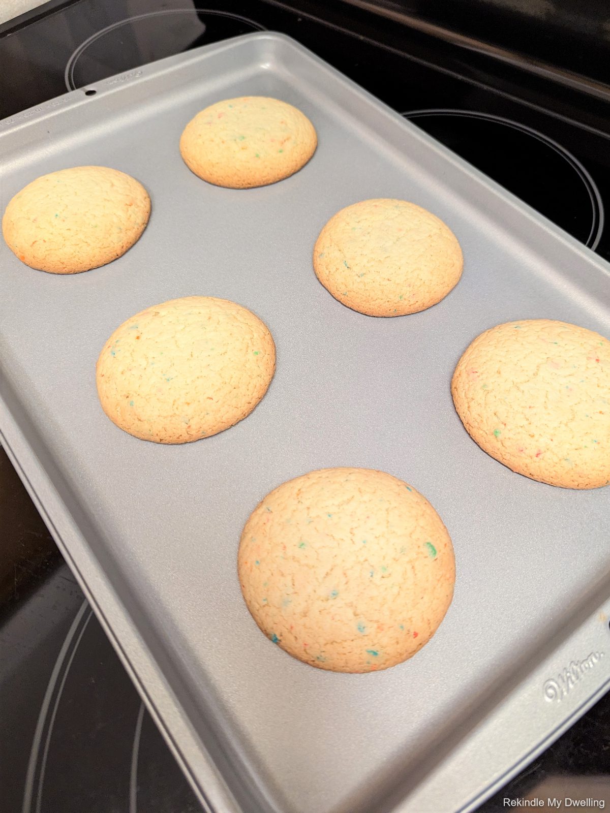 cake mix cookie sandwich on a baking pan.