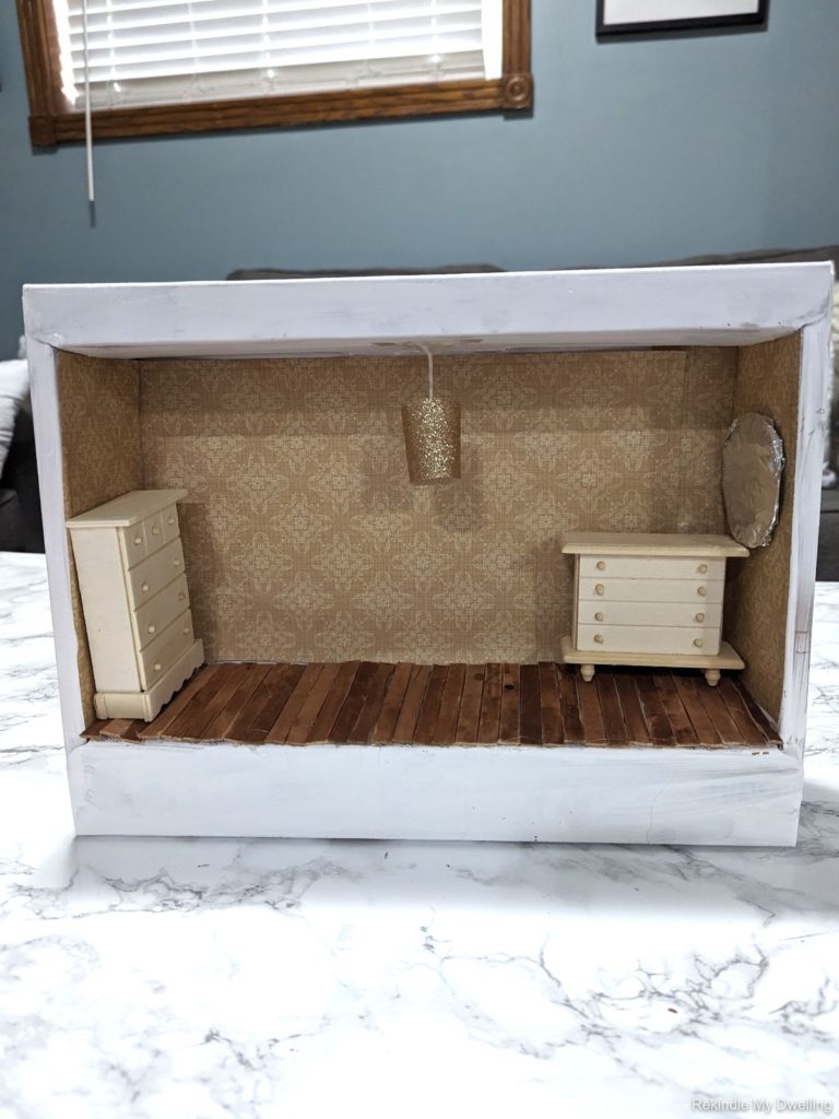 Diy cardboard box dollhouse with furniture.