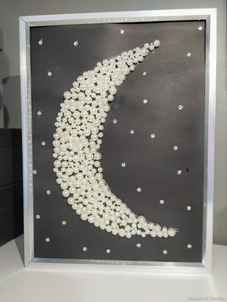 Diy moon decor inside a frame.